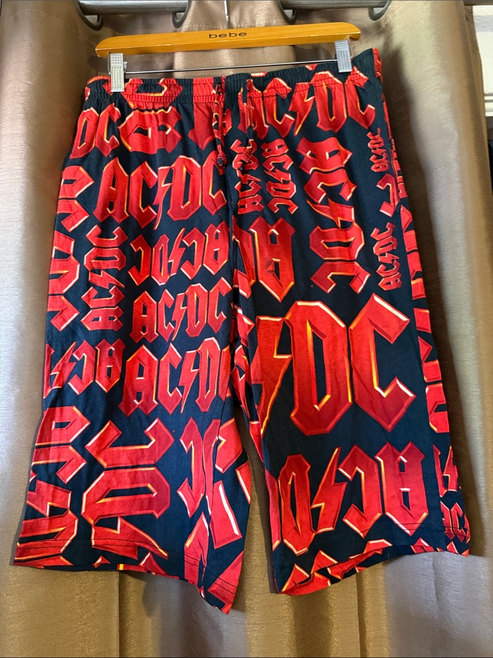 Vintage Y2K AC/DC Black Shorts with Bold Red Logo Print 2006 medium